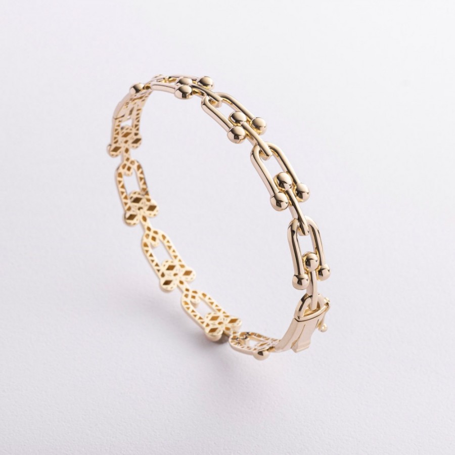 Жорсткий браслет "Фантазія" у жовтому золоті б05834