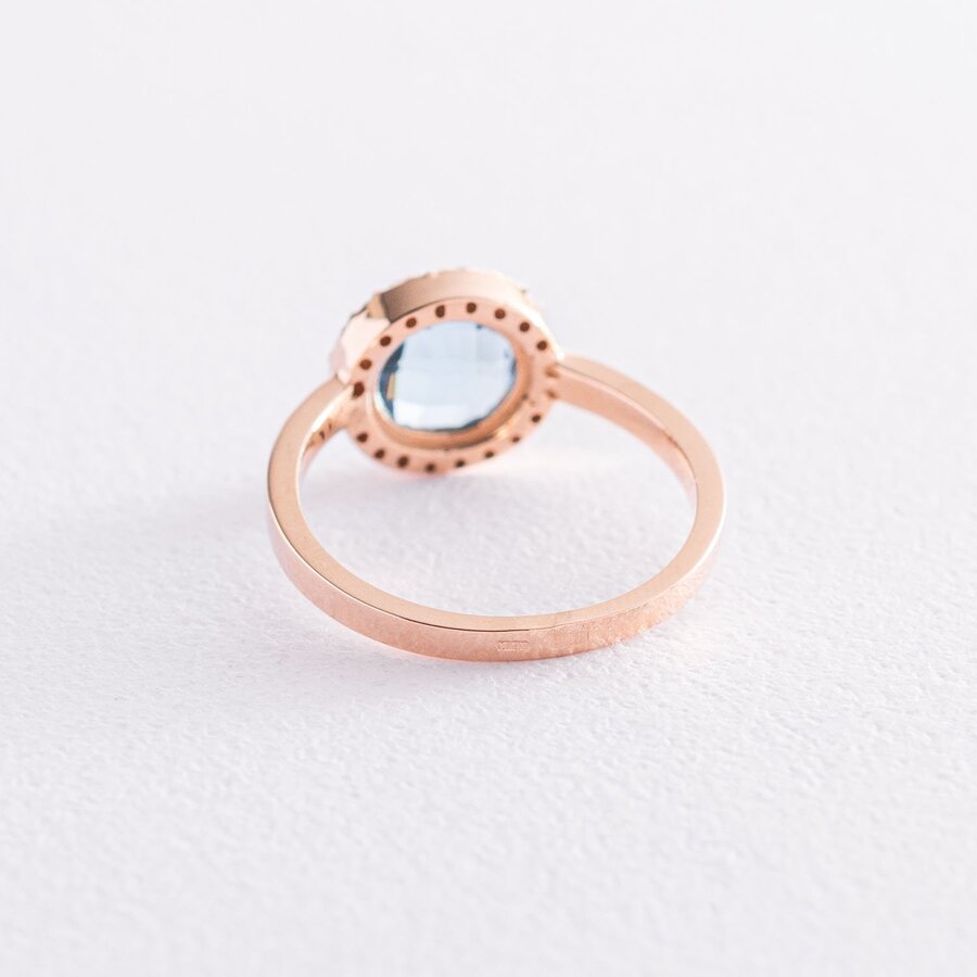 Золотое кольцо с голубым и белыми фианитами к06759
