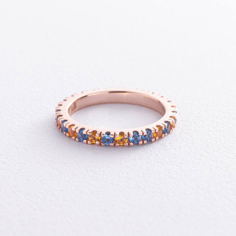 Кольцо с дорожкой голубых и желтых камней (красное золото) 815к
