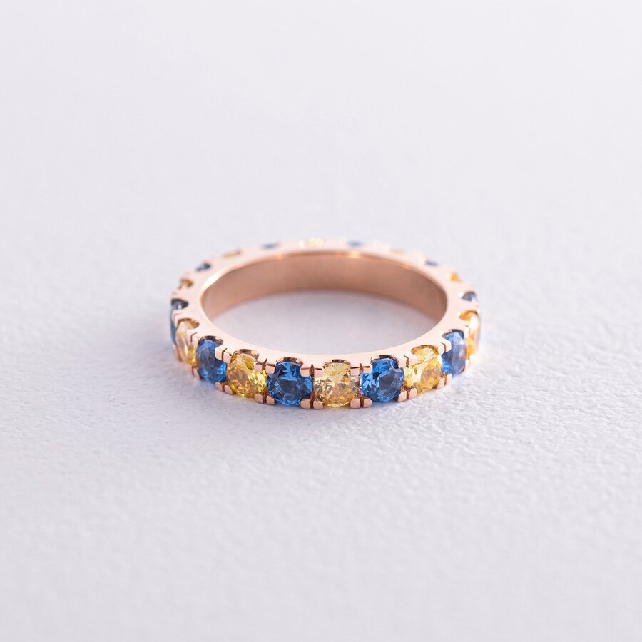 Кольцо с дорожкой голубых и желтых камней (красное золото) к07107
