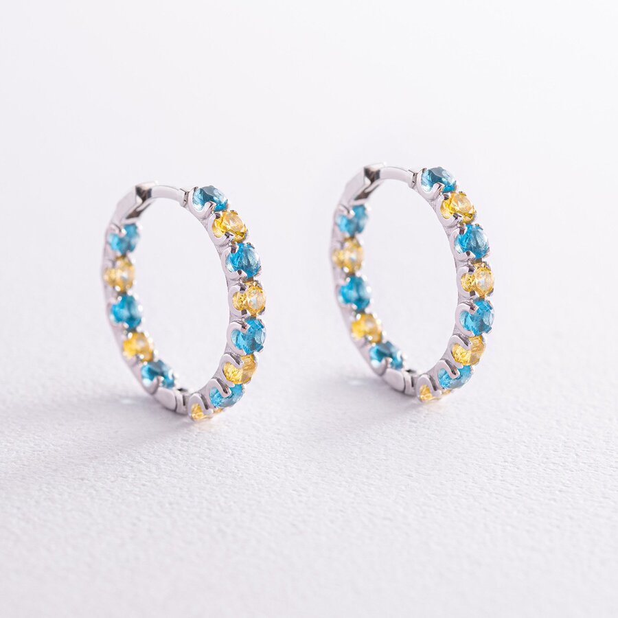 Срібні сережки - кільця з блакитними і жовтими фіанітами OR126610