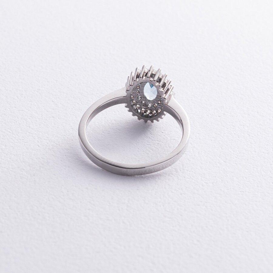 Серебряное кольцо с голубым топазом и фианитами GS-01-086-3010