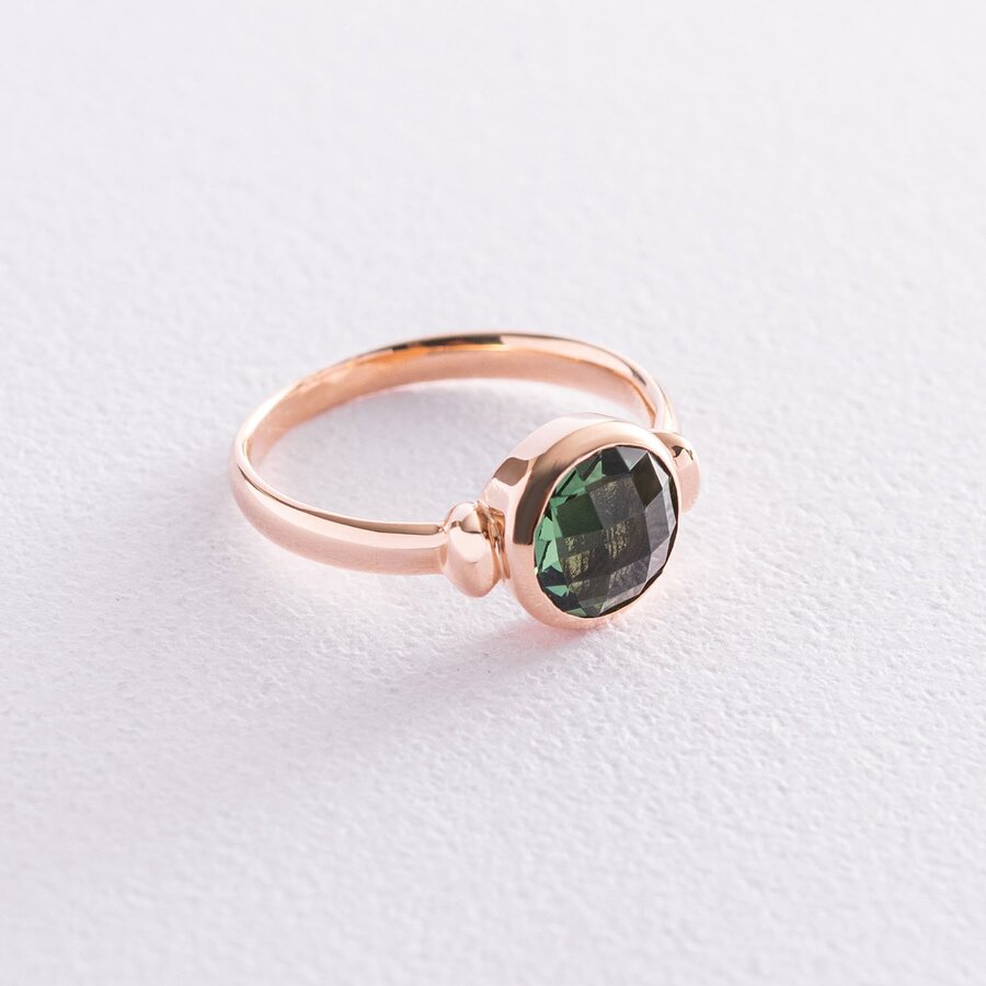 Золотое кольцо с зелеными фианитами к06758