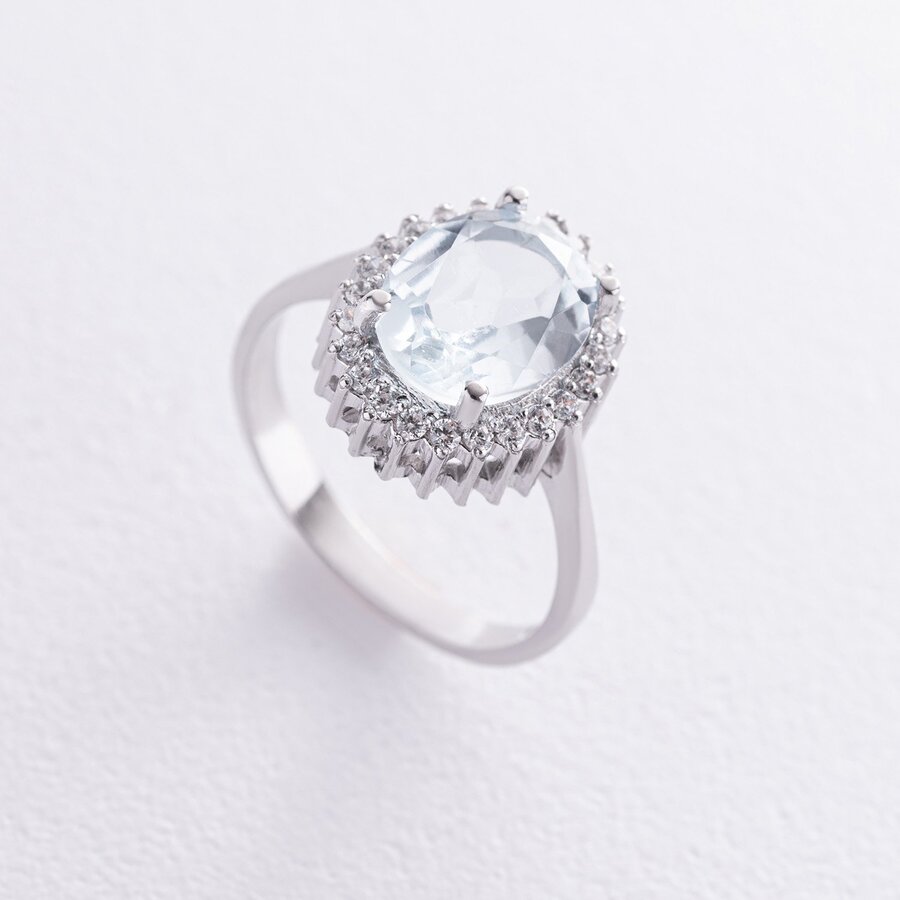 Серебряное кольцо с голубым топазом и фианитами GS-01-134-3910