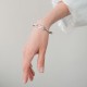 Жесткий браслет "Змея" в белом золоте (фианиты) б05623