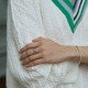 Каблучка з доріжкою каменів в білому золоті к08276
