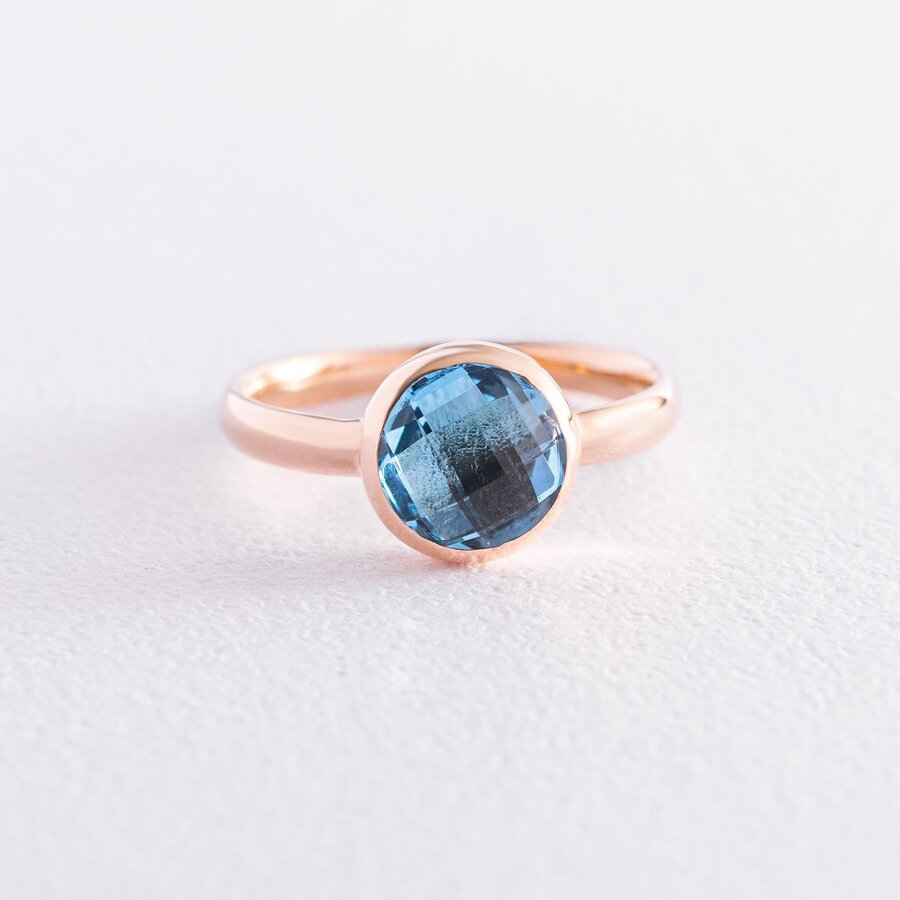 Золотое кольцо с голубым фианитом к06757