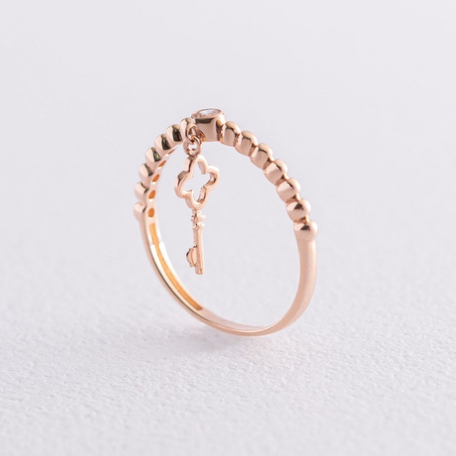 Золота каблучка "Ключик" з фіанітом к06800