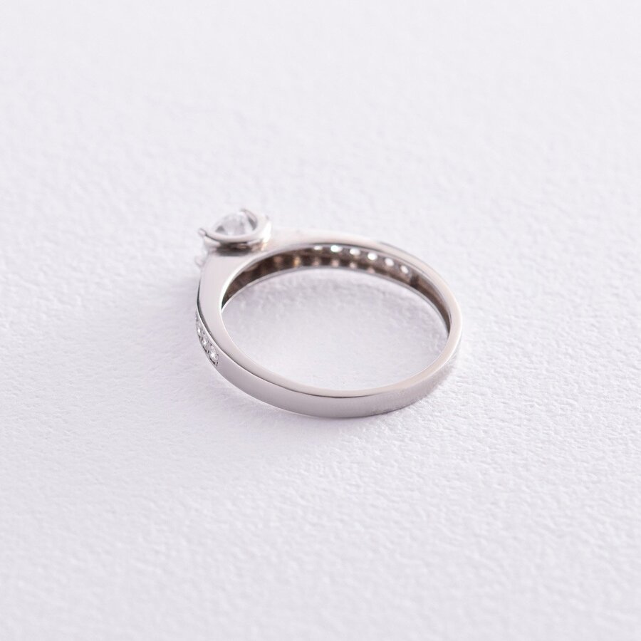 Помолвочное серебряное кольцо с фианитами 610