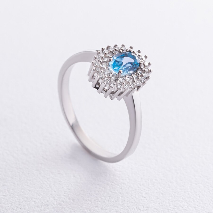 Серебряное кольцо с голубым топазом и фианитами GS-01-086-3010