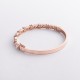 Жорсткий браслет "Rosie" з фіанітами (червоне золото) б05727