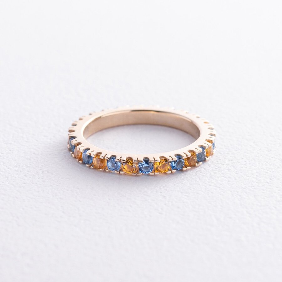 Кольцо с дорожкой голубых и желтых камней (желтое золото) 815ж