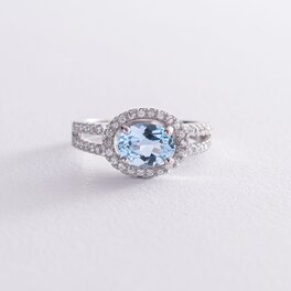 Серебряное помолвочное кольцо с голубым топазом и фианитами 111457
