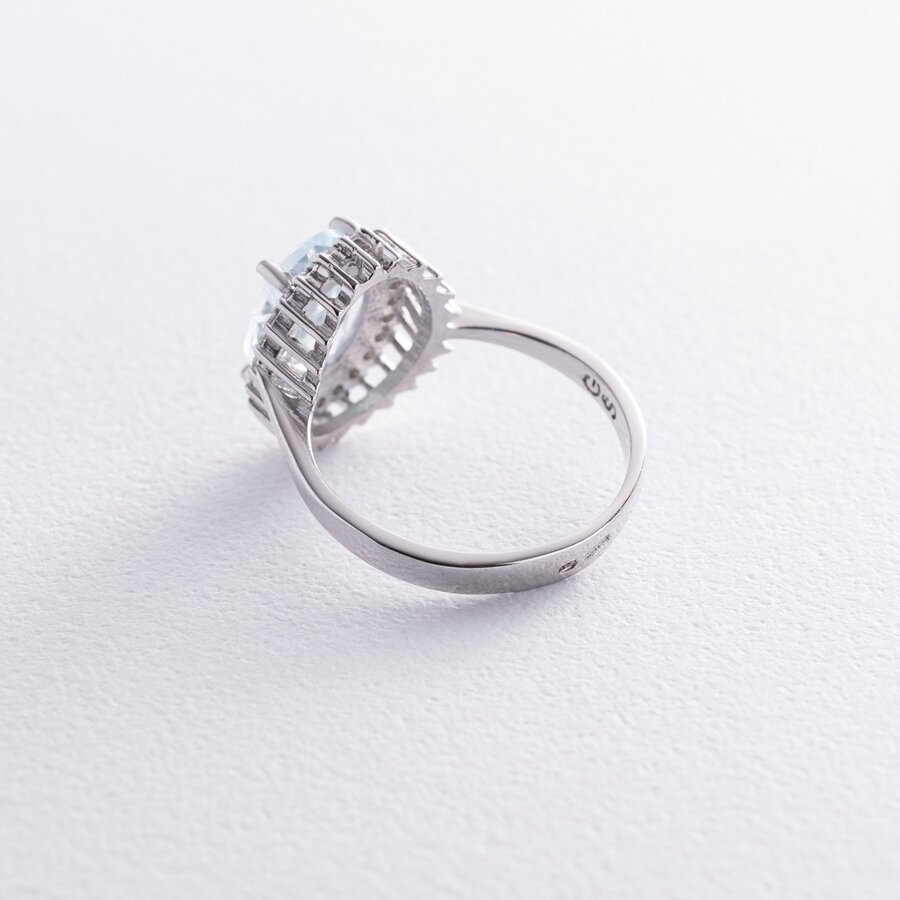 Серебряное кольцо с голубым топазом и фианитами GS-01-134-3910