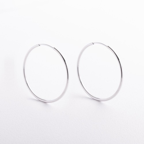 Серьги - кольца в белом золоте с09689